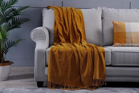 Grey and gold store throw