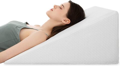 Pillow for gastric store reflux