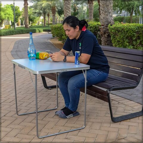 Camping table with store chairs