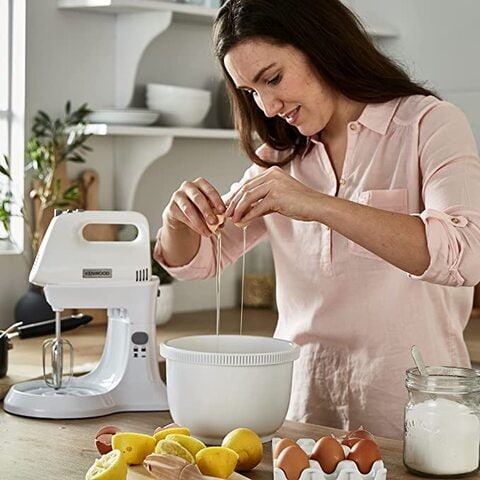 Hand mixer with stand clearance and bowl