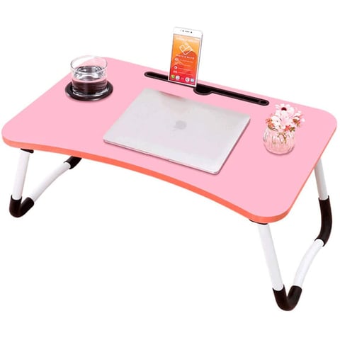 Pink laptop store desk