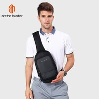Arctic Hunter Cross body Sling Bag Water Resistant Anti Theft Unisex Small Shoulder Bag with Built in USB Port for Business Travel XB001005 Black