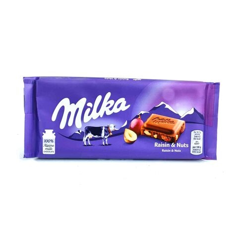 شوكولاتة ميلكا بالزبيب و البندق - 100 جم
