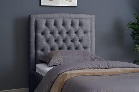 Gray upholstered store headboard