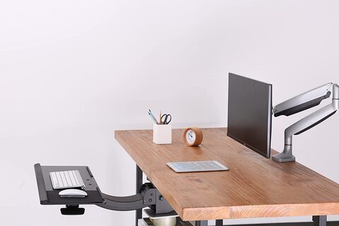 Adjustable desk deals with keyboard tray